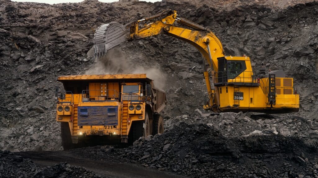 Excavator in open pit coal mine, Shutterstock ID#2293434657